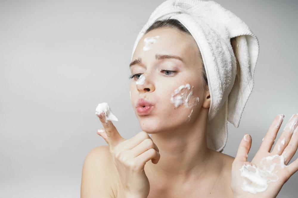 woman using facial foam