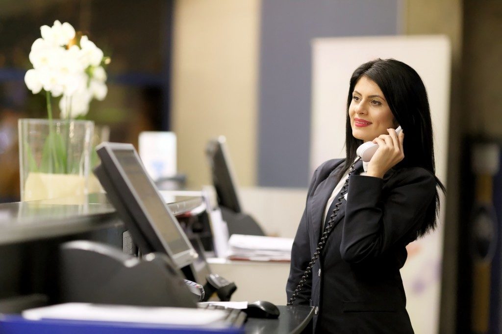 receptionist taking a call