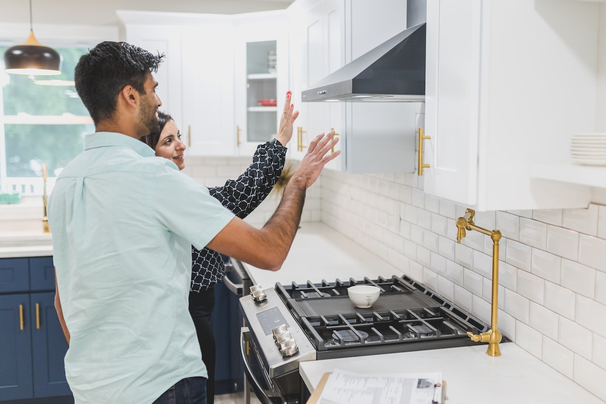 home buyer checking the kitchen