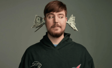 mr beast with money on his ear