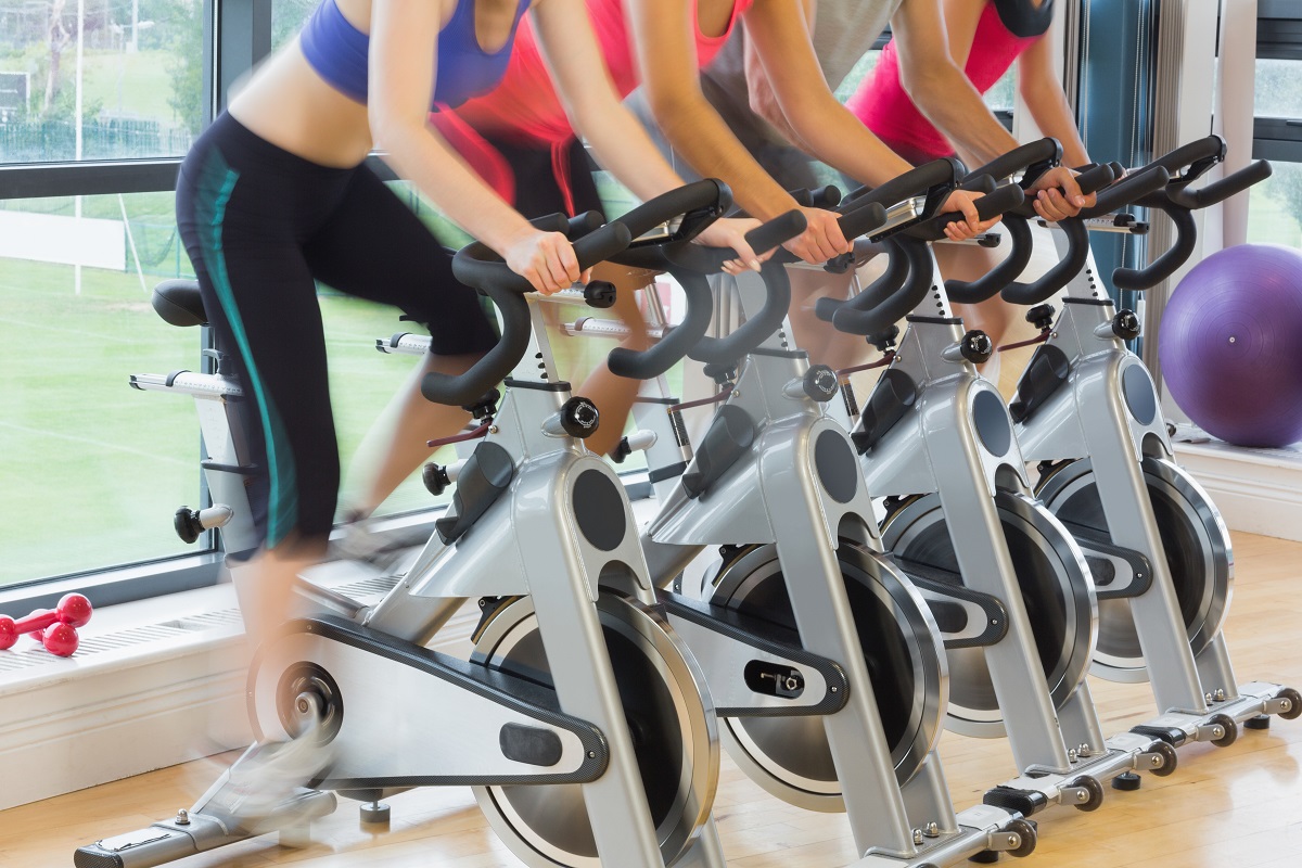 people working out at exercise bike