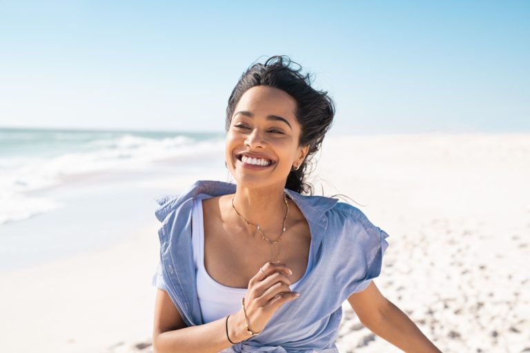 A woman running at the beach